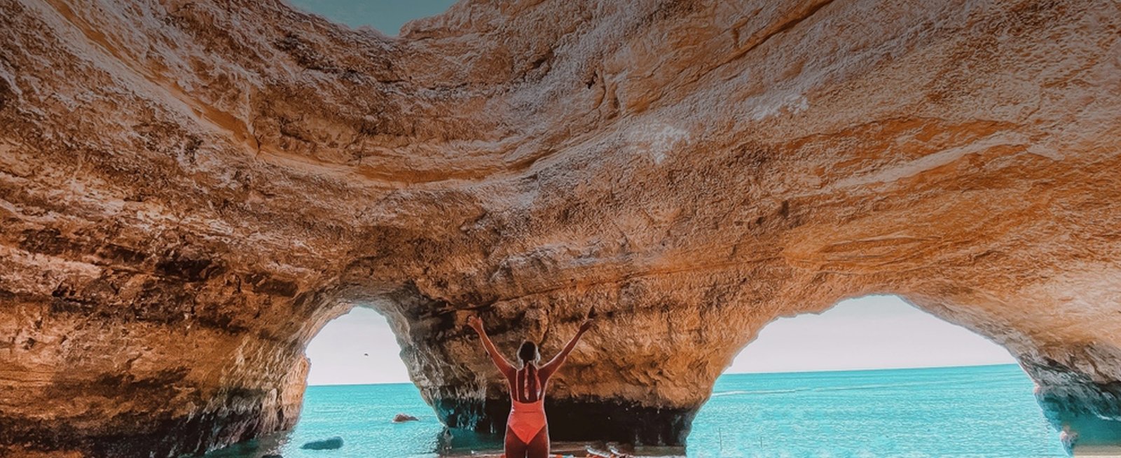Sunlight pouring into the Benagil sea cave on the Algarve coast